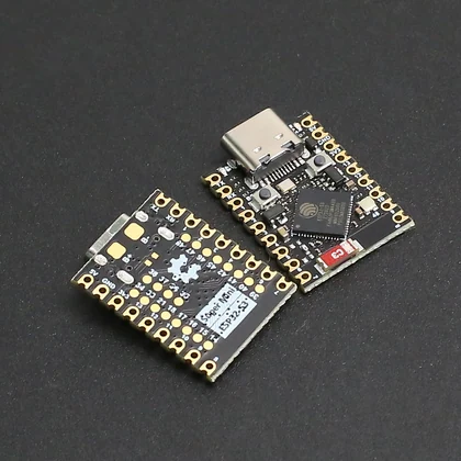 Board photo showing USB-C, buttons, antenna, side labels and the rear solder pads.
