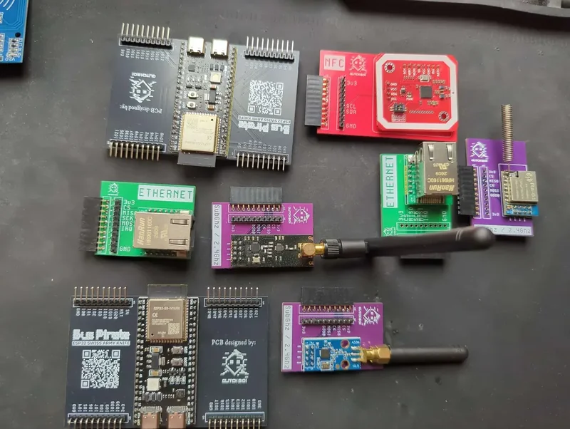 Dock PCB with plug-in adapter boards for Ethernet, NFC and radio modules.