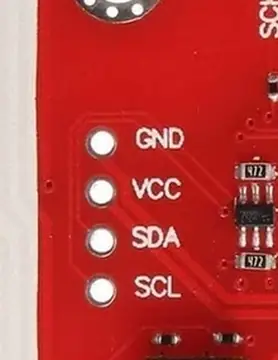 Close-up PN532 module photo showing GND, VCC, SDA and SCL labels on the side I2C header.