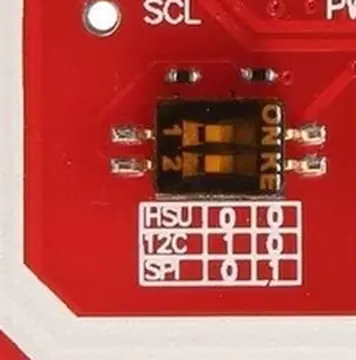Close-up PN532 mode switch photo showing the printed HSU, I2C and SPI jumper configuration table.